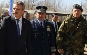 Minister Rossi  (L) heads the parade to honour the legacy of San Martin 