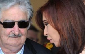 President Mujica and his peer Cristina Fernandez trying to send a message of neighbourly peace        