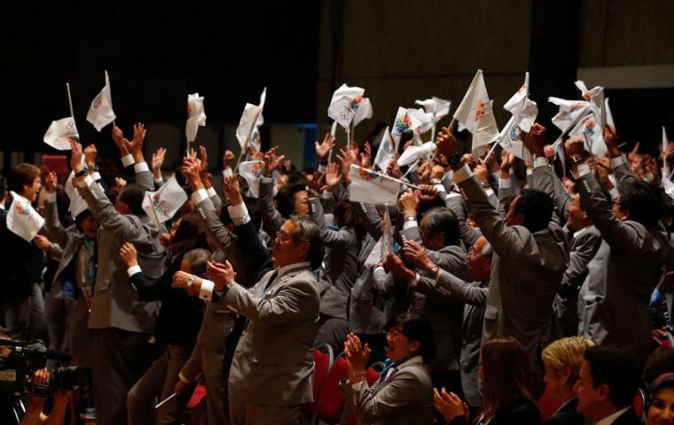 Japanese delegation celebrating 