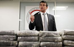 How nearly three dozen suitcases with illicit drugs could get through security at a major airport, asked French minister Valls