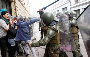 A common scene in recent years in downtown Santiago, clashes between Carabineros and protesting students 