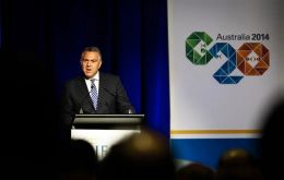 Australia's Treasurer Hockey reading the G20 ministerial communiqué