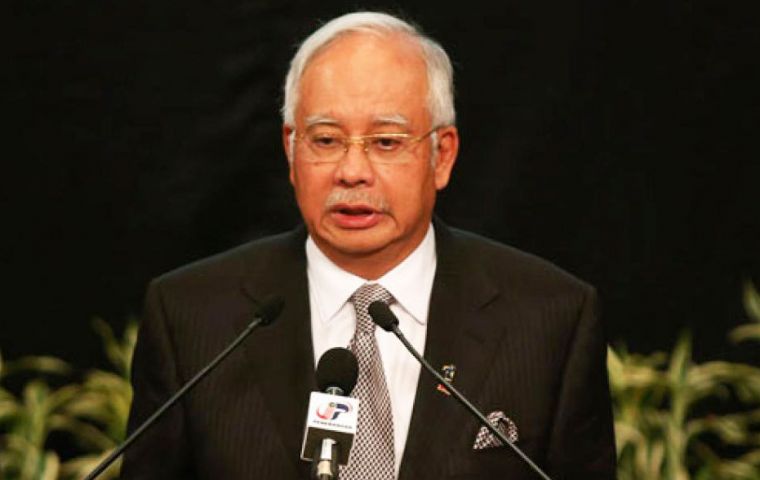 Prime Minister Najib Razak made the announcement while the US Navy dispatched a vessel to locate the aircraft's black box  