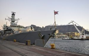 Table Mountain provides an impressive background to HMS Portland’s berth on the Victoria and Alfred Waterfront