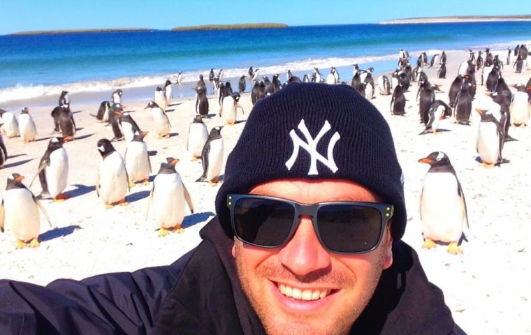 Lee at Bleaker Island with hundreds of gentoos penguins