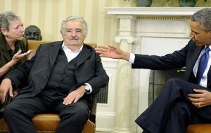 He also joked about Mujica's remarks regarding his white hair 