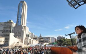 On Friday at the foot of the National Flag monument, Cristina Fernandez left aside the harsh rhetoric and called for dialogue 