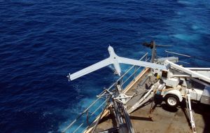 The launching of ScanEagle from a ship by pneumatic catapult 