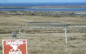 The 'Danger Mines' sign, a common sight dating back to 1982. An estimated 18.000 mines are still 'live' in the Islands   
