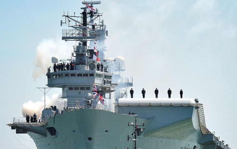 The ship, carrying its 700-strong crew, gave a gun salute as it arrived at Portsmouth Harbor and military aircraft performed a fly-past (Pic PA)