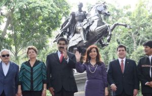  The family picture in Caracas next to the statue of Bolivar