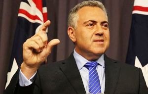 “The mining tax is now gone,” Treasurer Joe Hockey told parliament after the Senate, where minor parties hold the balance of power, voted 36 to 33 for repeal