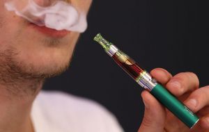 The verb is defined as “to inhale and exhale the vapor produced by an electronic cigarette or similar device.”