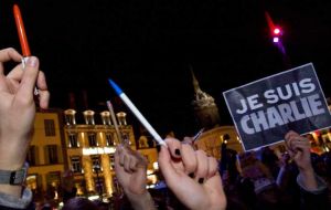 Citizens in Paris and in cities around France responded to the murders by gathering in huge silent crowds. Many carried signs “Je Suis Charlie” 