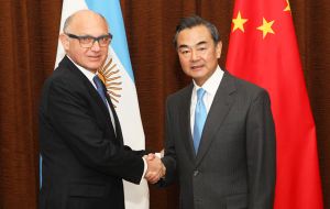 Hector Timerman and Wang Yi in Beijing after ironing out the details for the Argentine president's visit 