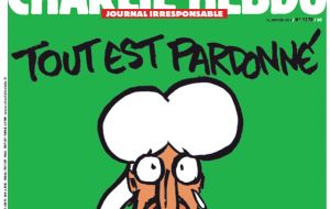 The front page has an image of the Prophet Mohammad holding a sign saying “Je suis Charlie” below the headline “Tout est pardonné”( All is forgiven”).