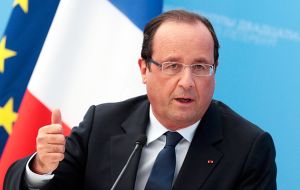 Hollande struck a careful balance between France's commitment to protect its 5 million-strong Muslim minority and to uphold the principle of free speech