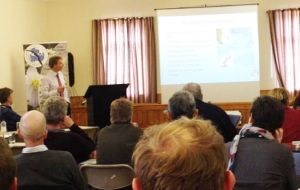 Dr. Martin Collins OBE discusses South Georgia during the symposium in the Falklands with scientists from North and South America