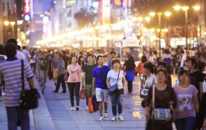 China's retail sales rose 11.9% last month from a year earlier, while factory output rose 7.9% in the same period. Both economic measures beat forecasts.