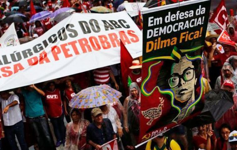 Police said 12,000 people blocked one of the main avenues of Sao Paulo, marching in defense of Petrobras and worker rights threatened by belt-tightening economic policies. (Pic Reuters)