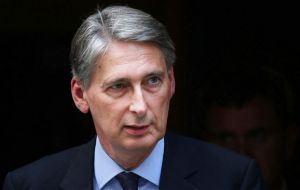 Foreign Secretary Philip Hammond had earlier condemned Russia's “flagrant breach of Ukrainian and international law” in seizing Crimea a year ago.