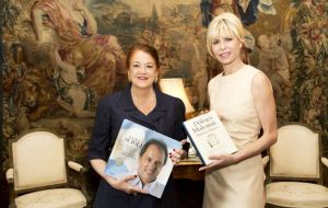 Ambassador Castro with a book dedicated to Daniel Scioli, husband of Karina Rabolini, and leading presidential candidate for Argentina's presidential election