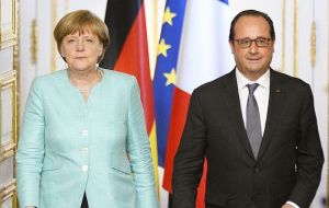 In Paris Merkel and Hollande said Athens must move quickly if it wants to secure a cash-for-reform deal with international creditors (Pic AFP)