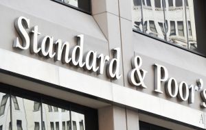 S&P’s “BBB-” rating is one notch above junk status. Fitch’s “BBB” and Moody’s “Baa2” ratings are two notches above junk status.