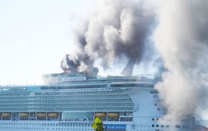 Black smoke could be seen billowing from the 1,112-foot Freedom of the Seas as it docked in Jamaica on Wednesday with 4.500 passengers.