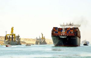 Three container ships crossed the new waterway, state news agency MENA reported. An American, Danish and Bahraini ships made the first trial