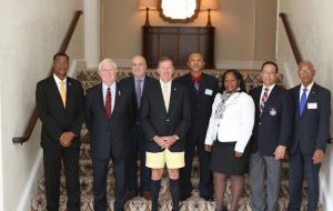 The participants of the meeting in Hamilton pose for the 'family picture' at the end of discussions  