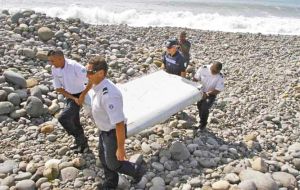 Investigators in France ascertained that the barnacle-covered debris, a 2-2.5 meter  wing surface known as a flaperon, belonged to MH370