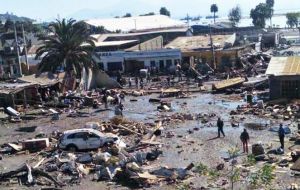 Wrecked houses and businesses were visible in images of other affected seaside towns and cities. Significant flooding was also reported in Illapel