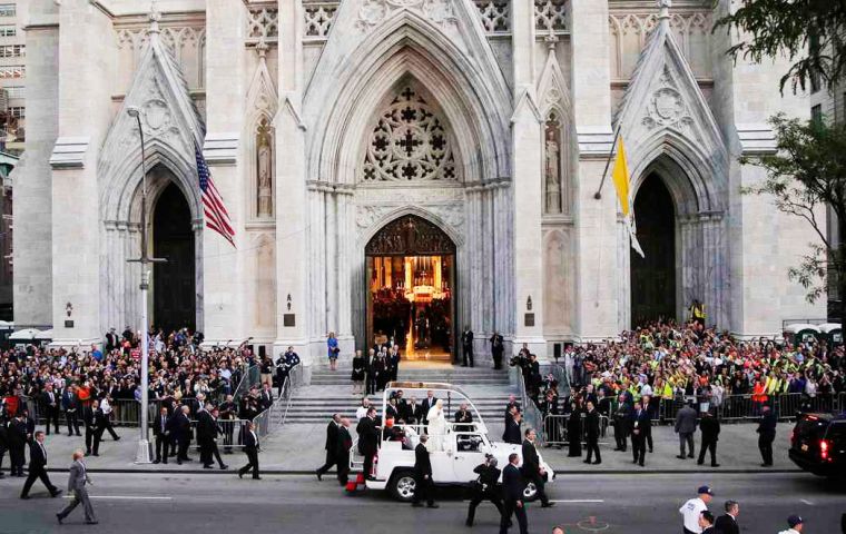 St Patrick's cathedral bells pealed as Francis waved to and blessed the crowd, even giving the occasional thumbs-up.