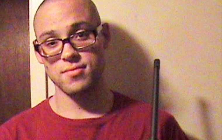 A picture of him holding a rifle appeared on a MySpace page with a post expressing a deep interest in the Irish Republican Army.