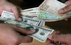 At the official exchange rate of 6.3 bolivars per U.S. dollar, which the bank uses for its financial statements, the decline would be equivalent to $2.74 billion