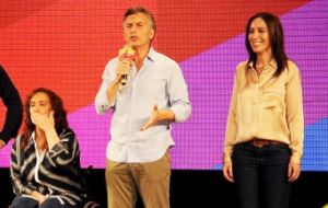 Macri also embraced his ticket companion, vice-president Gabriela Michetti (L) and Maria Eugenia Vidal the next governor of Buenos Aires province