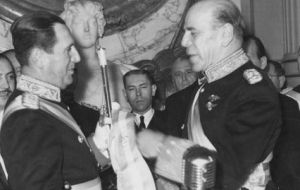 Juan Peron, the most revered political figure of Argentina in the last seventy years, (three times president) receiving the sash and baton...yes at Casa Rosada.
