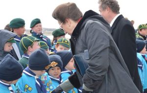 The Princess Royal chats with children during the unveiling of a marker for the Commonwealth Walkway
