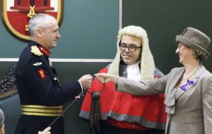 Lt-General Davis was formally sworn in and the Keys to Gibraltar were surrendered to him by Acting Governor Alison Macmillan (Pic Governor Davis accepts the Keys to Gibraltar.(Pic © HM Government of G