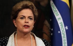 Rousseff said more credit from state banks would not undermine efforts to curb government spending and bring down annual inflation that exceeded 10% last year