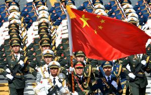 China will increase military spending by 7.6% this year, its lowest increase in six years, as it pursues a modernization plan that will shrink staffing.