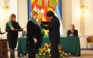 With her counterpart, Choquehuanca Cespedes during the honor awarding ceremony  