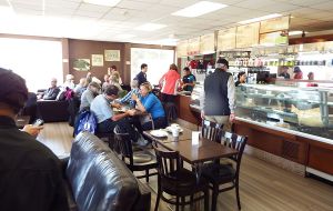 One of the many local bars and coffee shops where visitors can rest and recover after the walking tours of Stanley