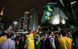 Police said 2,500 people demonstrated outside the presidential palace in the capital of Brasilia and others flocked to Sao Paulo's main Avenue Paulista. 
