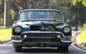 The late Chavez driving the iconic convertible Cadillac back in 2006. At the time she was working smartly 