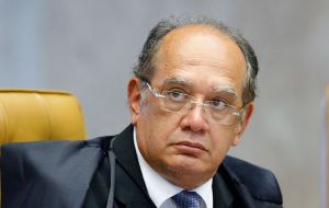 Justice Gilmar Mendes temporarily banned Lula's nomination to the Cabinet saying it was an attempt to shield him from possible detention in corruption probes. 