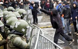 Police in the capital Santiago reported that 117 people were arrested and 32 officers injured on Thursday. 