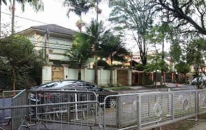 Police officers and members of the presidential security are posted in front of the home, where Temer usually spends weekends and his younger son and his wife live.