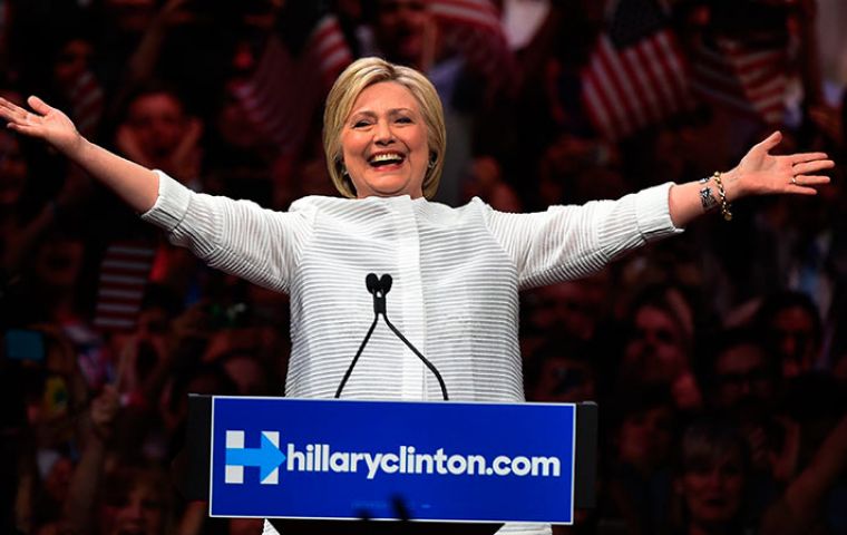 Mrs. Clinton took the stage in Brooklyn with hands clasped over her heart in gratitude, then threw open her arms with a jubilant crowd chanting “Hillary.”